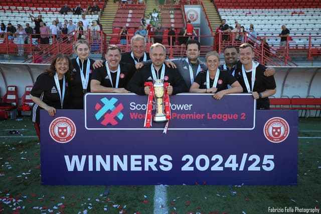 Kevin Middleton holding the SWPL 2 trophy with Hamilton Academical Women's